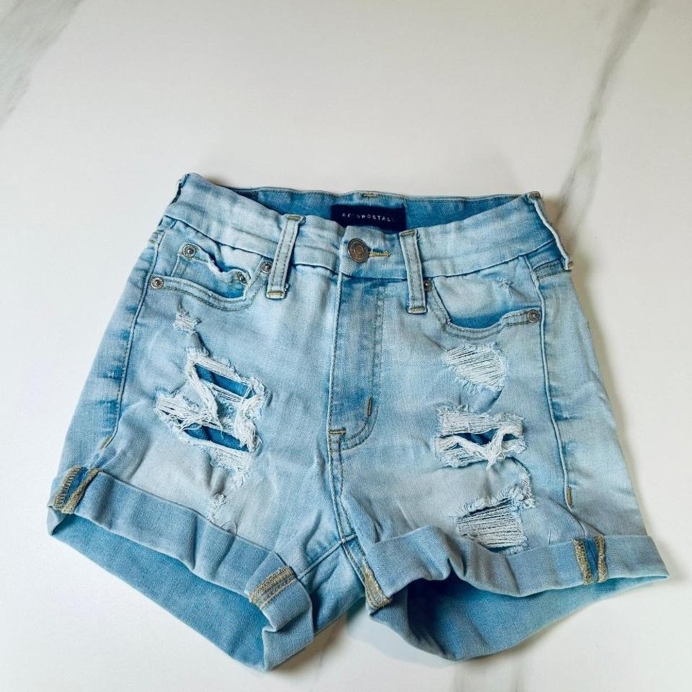 High rise distressed curvy denim shorts